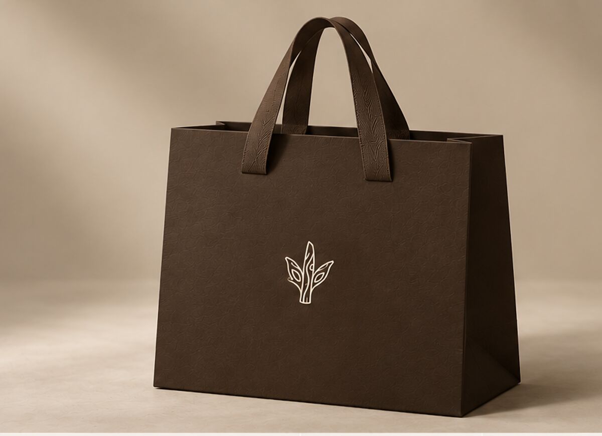 A dark chocolate SÉVAURE paper bag with the leaf mark