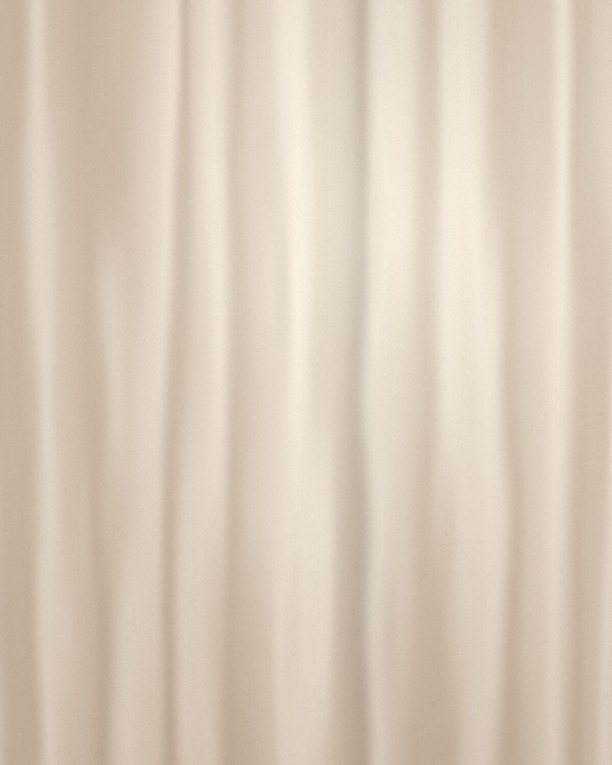 Daylight through a sheer linen curtain
